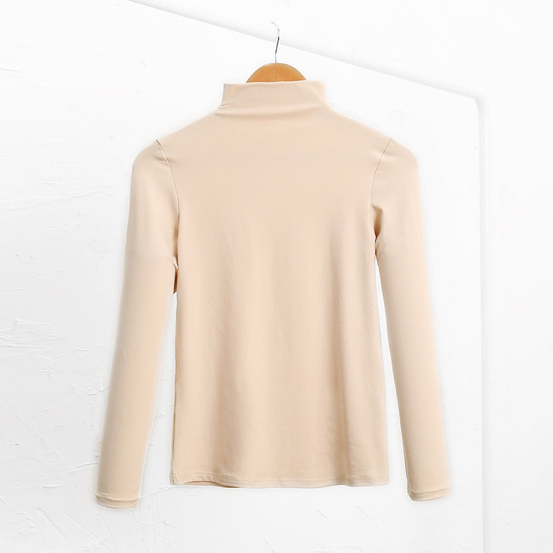 Isla Baxter | Fleece-Lined Turtleneck Long Sleeve Top