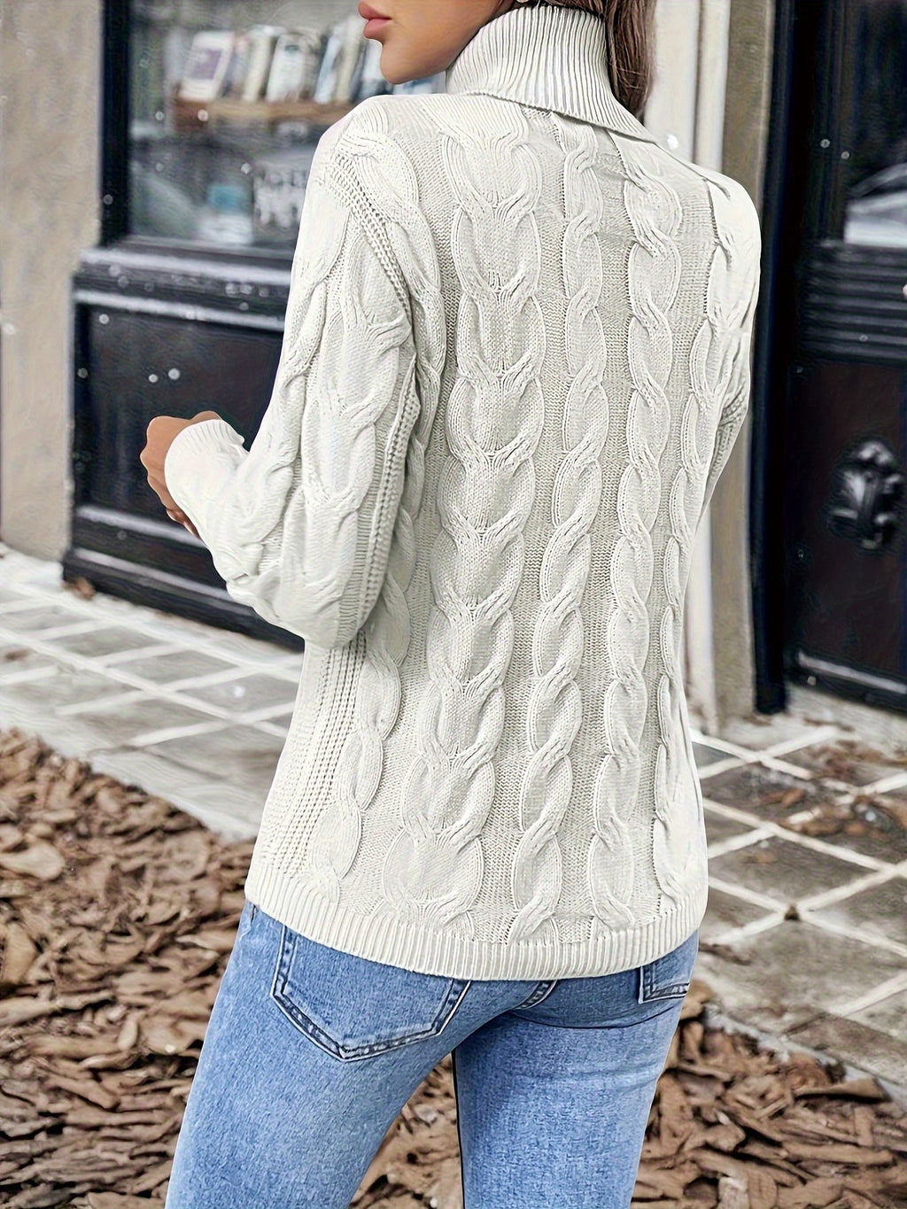 Kirsty Whitmore | Cozy Cable-Knit Turtleneck Sweater